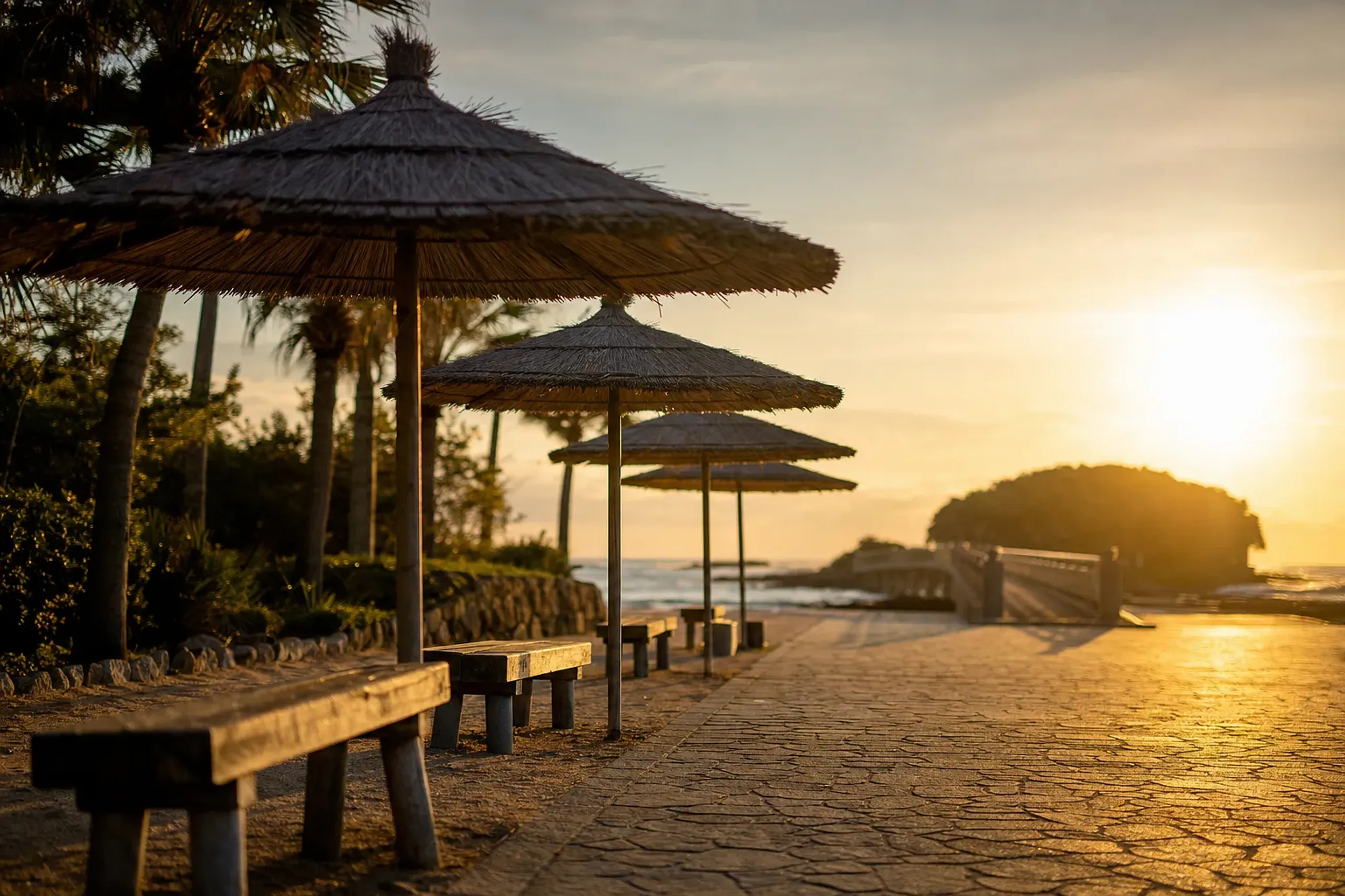 parasols and benches along Aoshima Beach Park beside the approach bridge