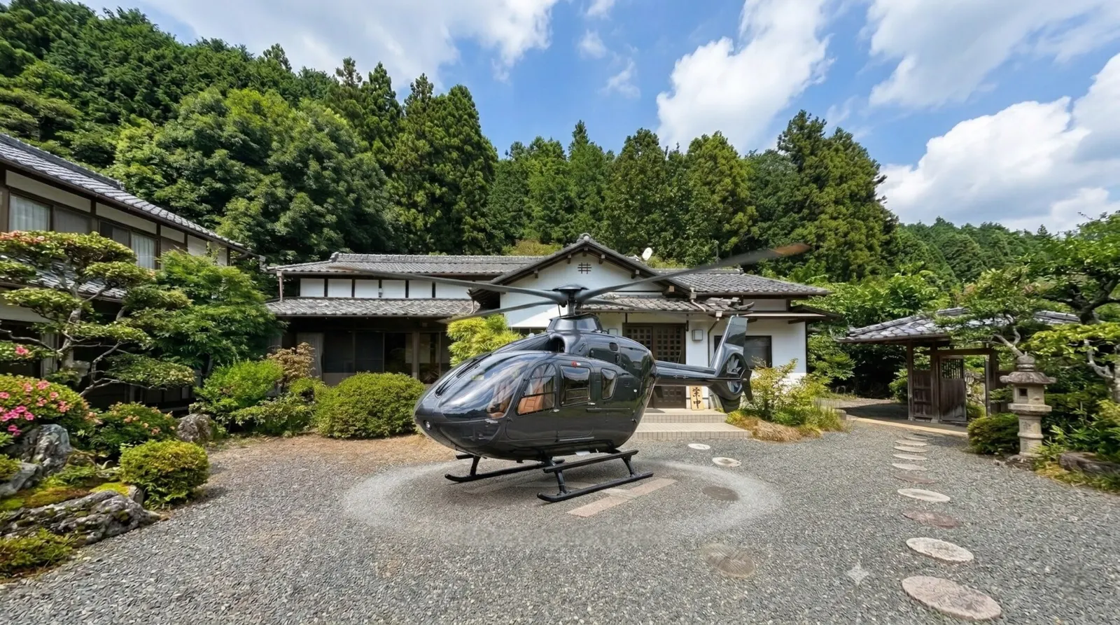 A luxury private helicopter landing directly on the private helipad at Gosho No Iri 御所ノ入