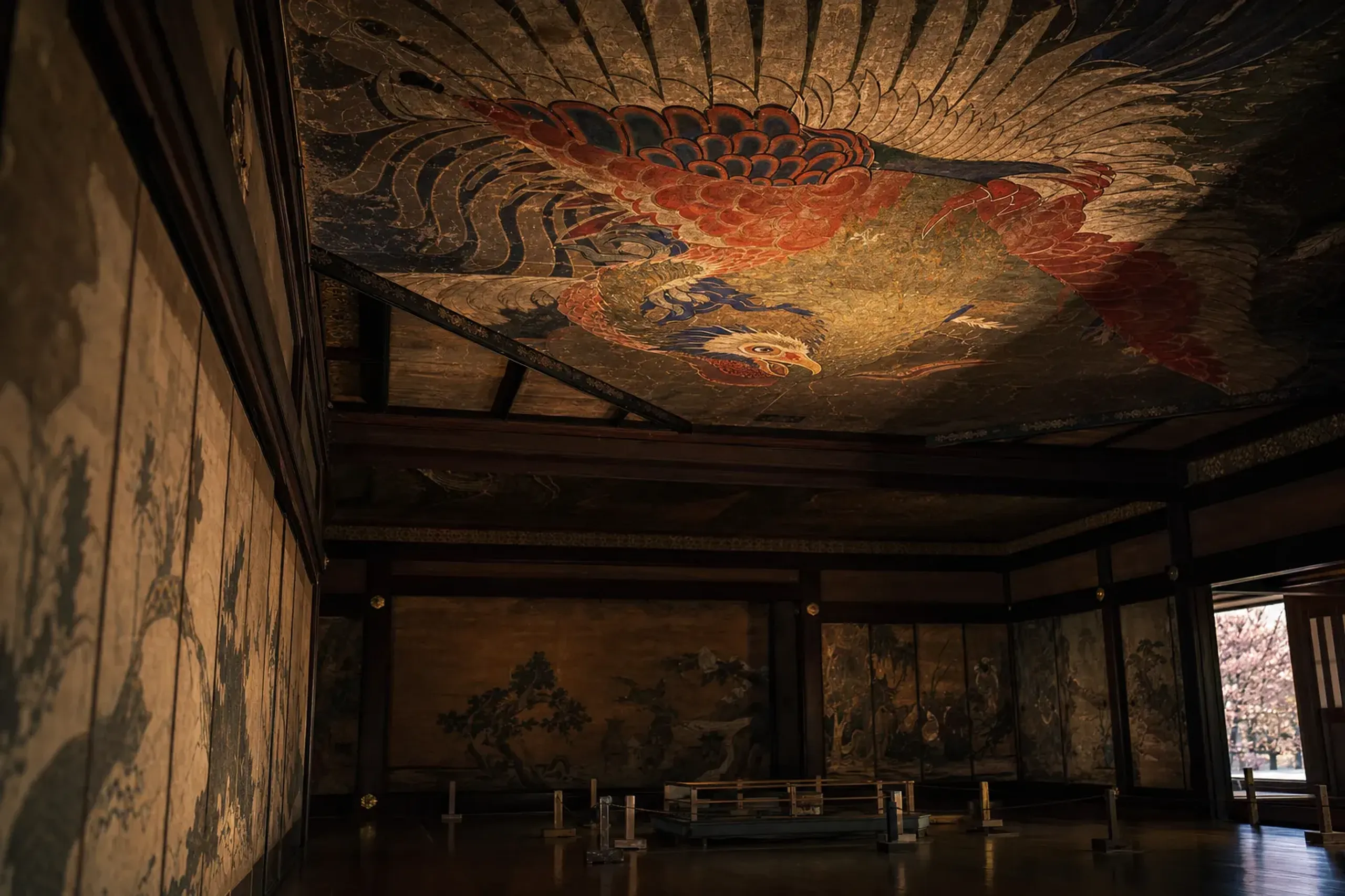 A vividly painted phoenix ceiling panel and other late-period ukiyo-e works by Katsushika Hokusai displayed in Obuse
