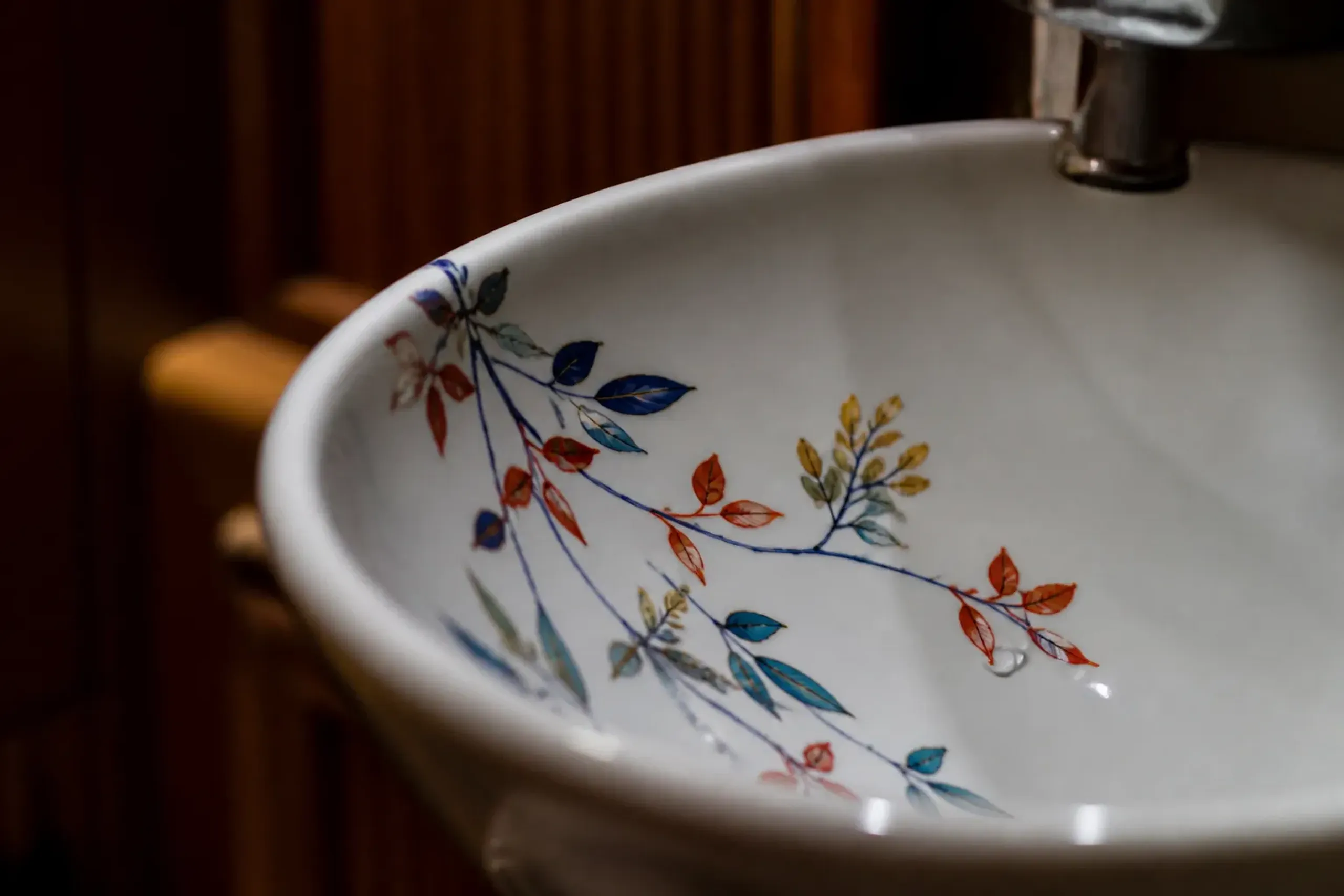 A custom porcelain washbasin crafted by Sakaida Kakiemon XIV inside a private suite on the Seven Stars train.