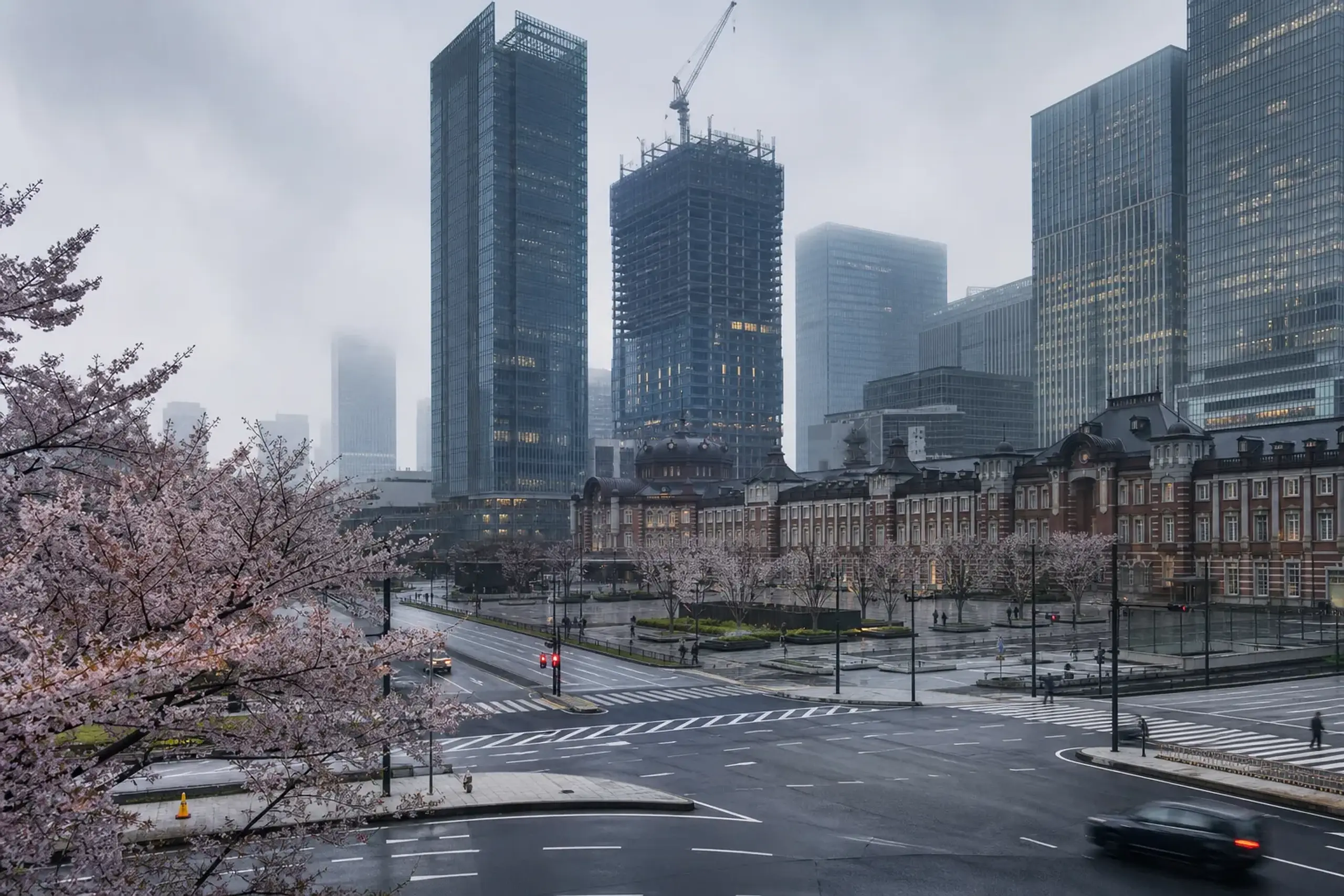 View of the Yaesu area near Tokyo Station with new redevelopment towers and busy crosswalks