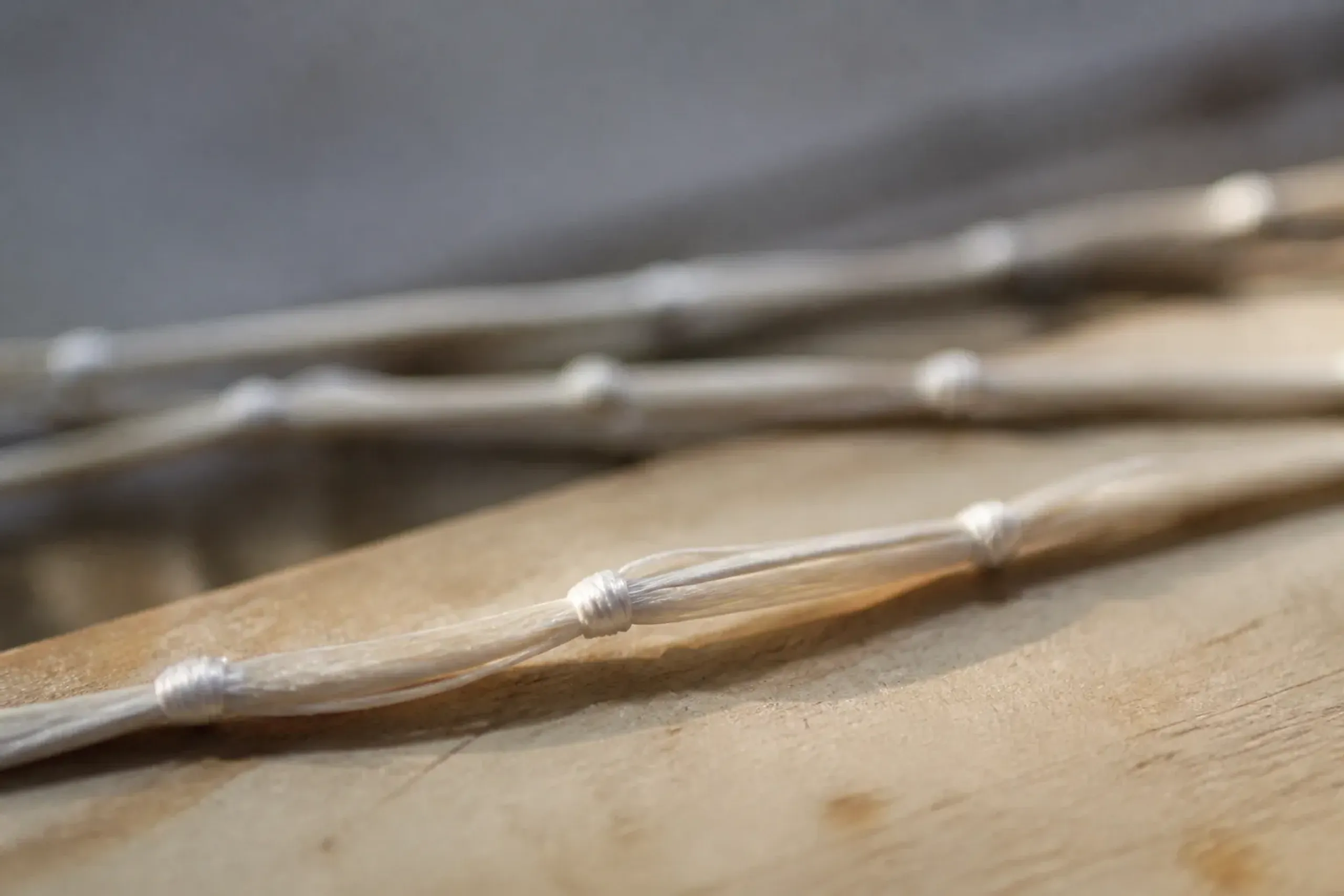 Kasuri-kukuri binding on threads marked and tightly tied to resist dye