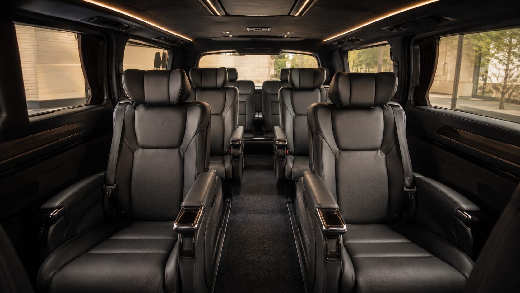 Interior view of the Toyota GranAce Premium armchair rows