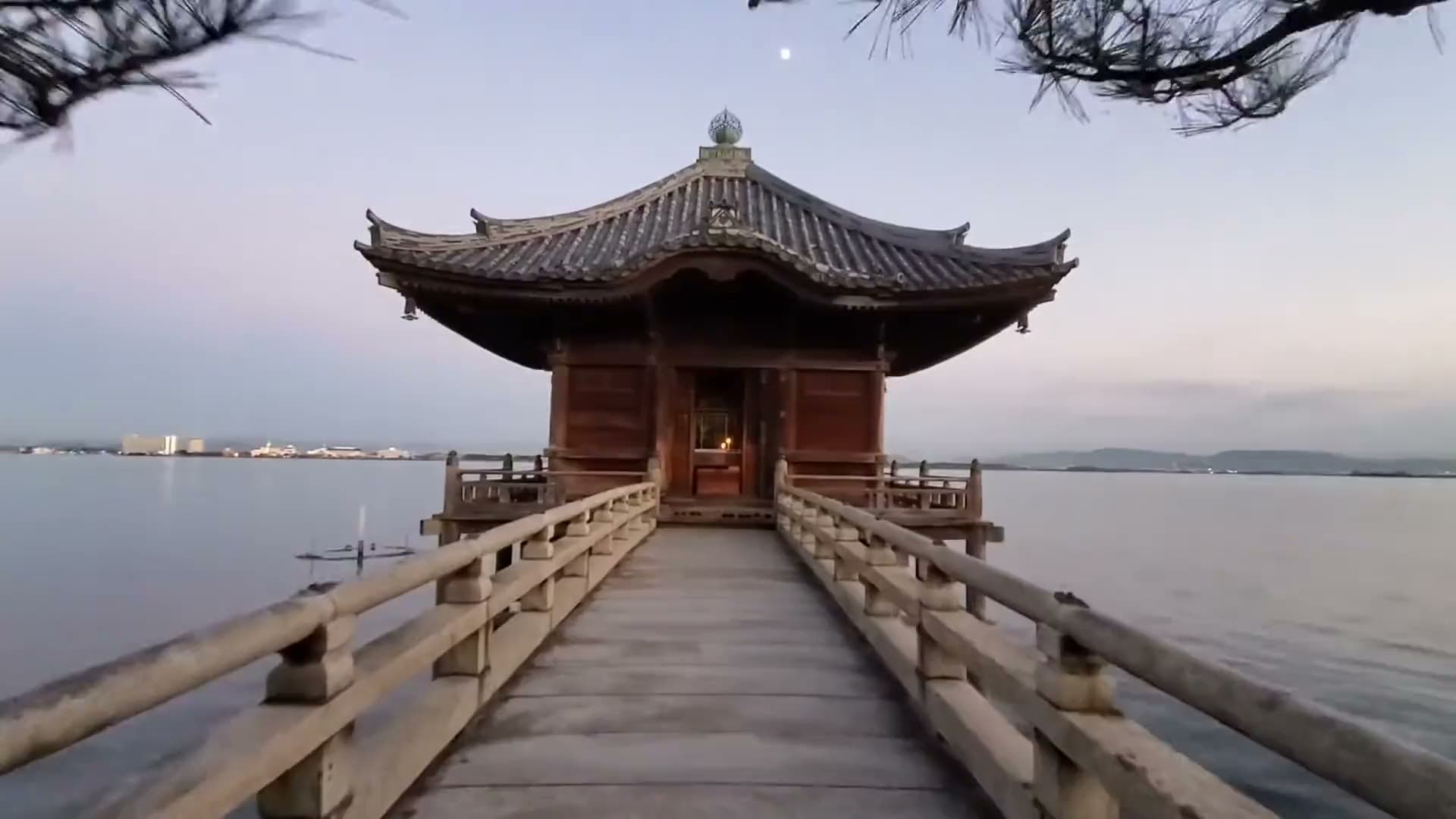 Ukimido temple resting on Lake Biwa at dusk