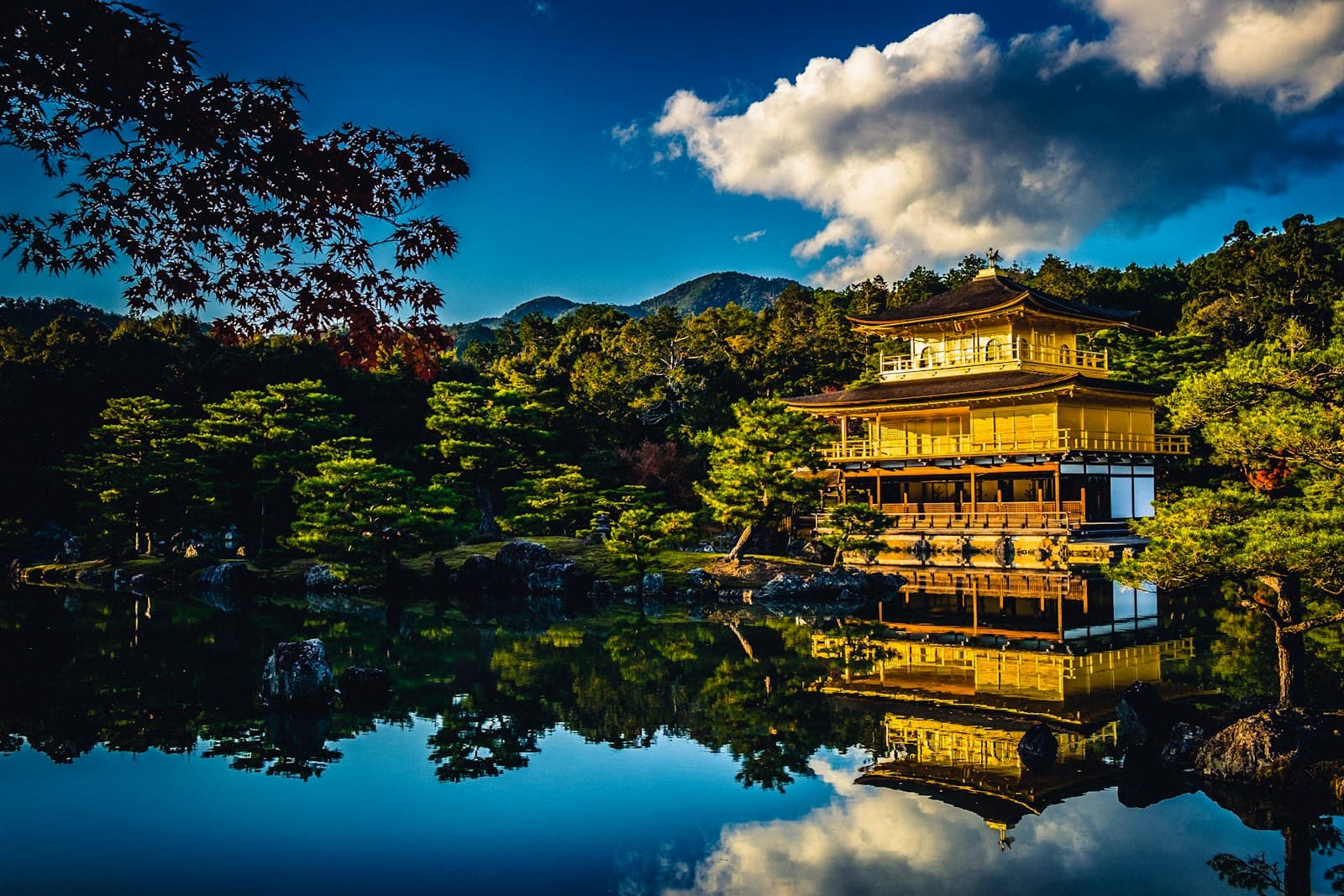 Kinkaku-ji golden pavilion reflected in its pond