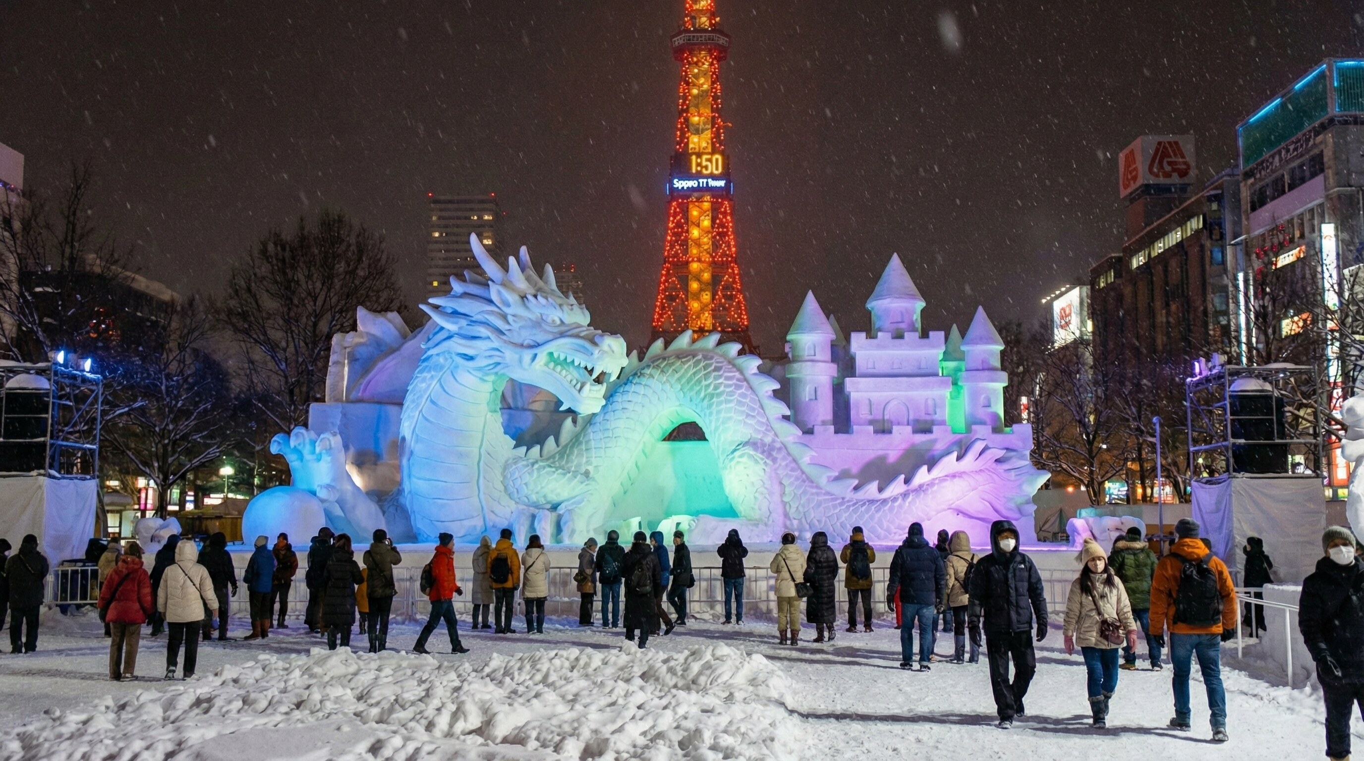 Massive illuminated snow sculpture at the Sapporo Snow Festival 2026 in Odori Park, Hokkaido.