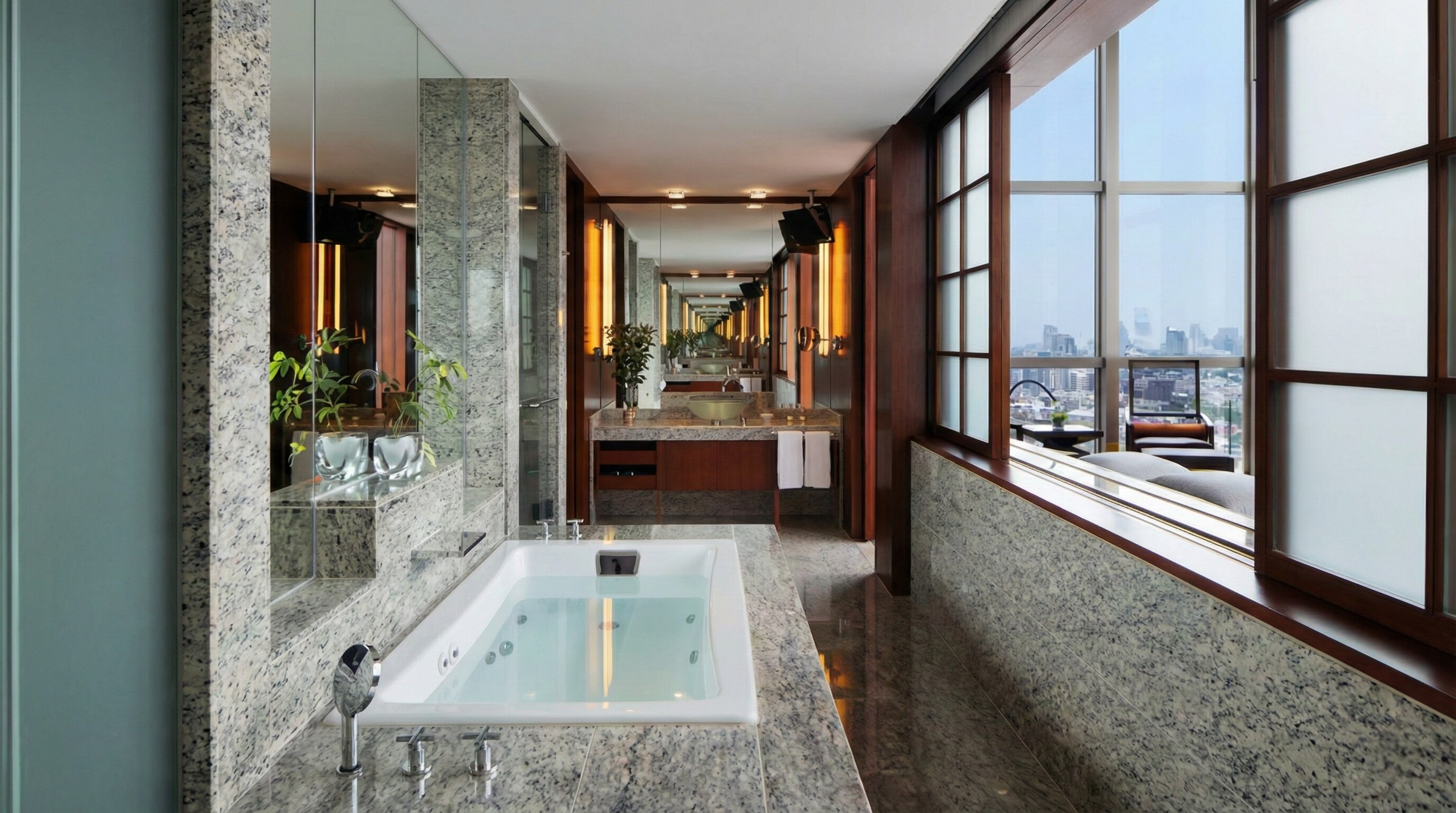 Luxury limestone bathroom with soaking tub in Grand Hyatt Tokyo Presidential Suite.