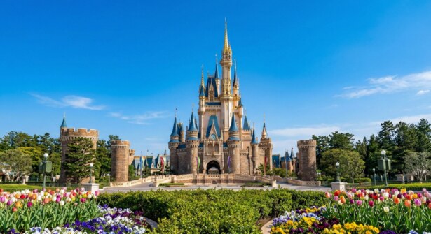 A clear, uncrowded view of Cinderella Castle at Tokyo Disneyland on a sunny day