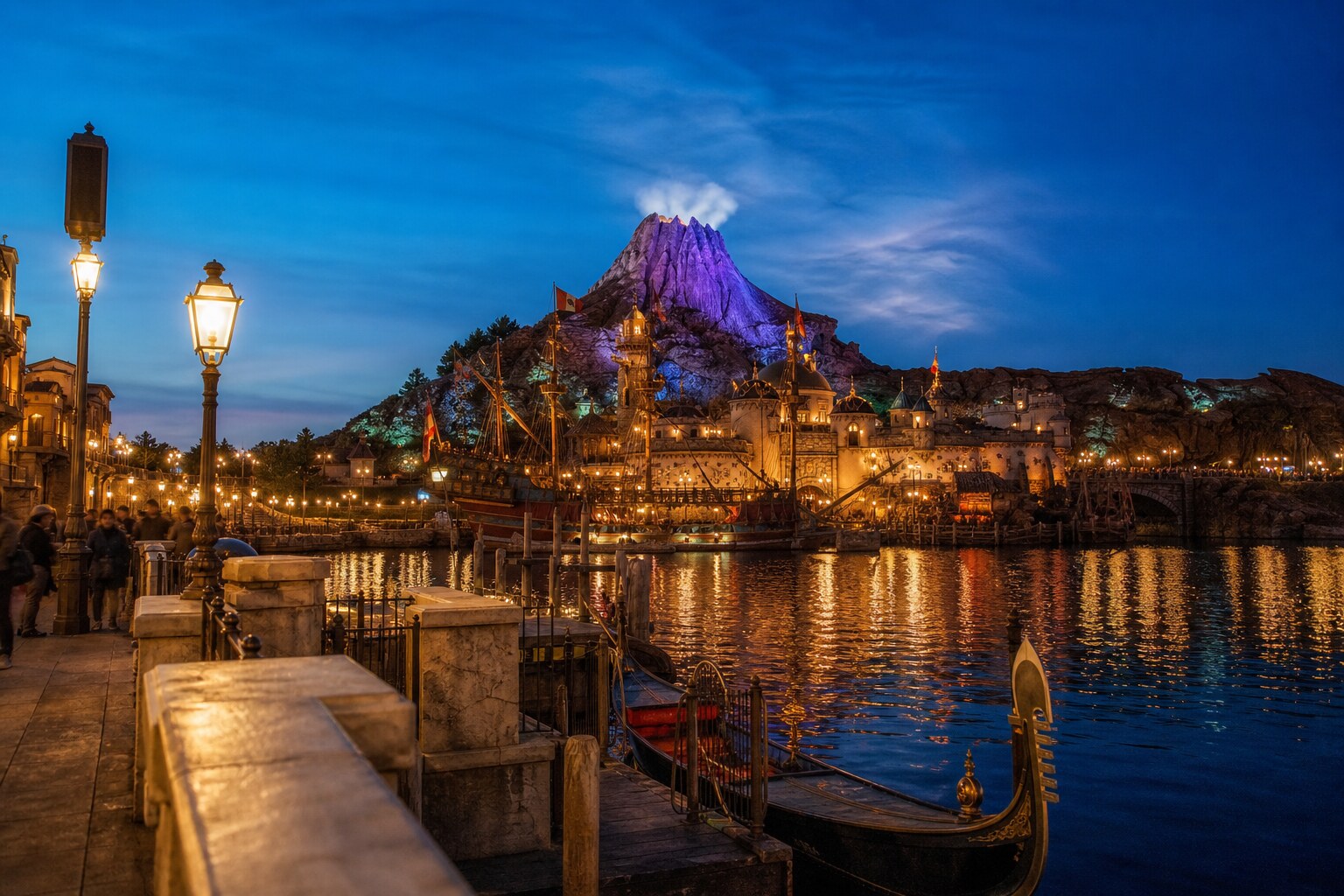 Tokyo DisneySea Mediterranean Harbor at dusk with lights reflecting on the water