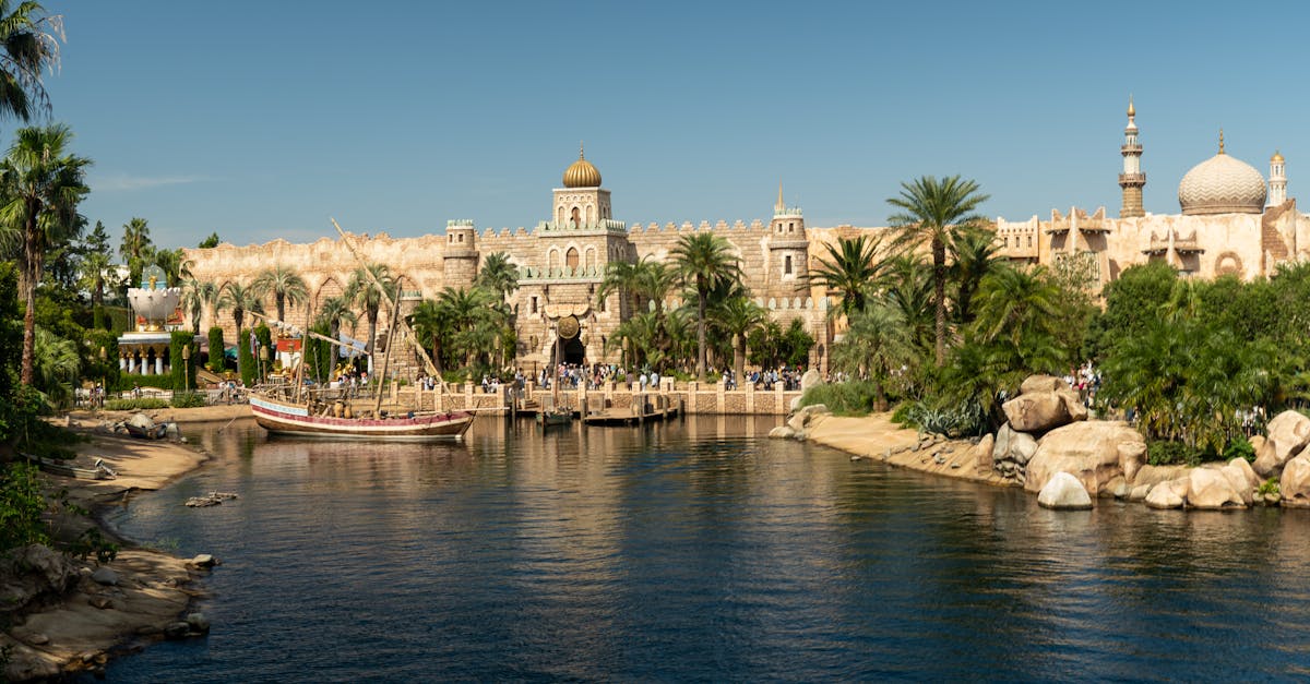 Captivating view of the Mediterranean Harbor at Tokyo DisneySea with boats and lush greenery. — Photo by Edgar Mirambel on Pexels