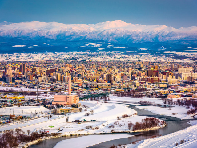 Asahikawa, Japan winter cityscape in Hokkaido at dusk.