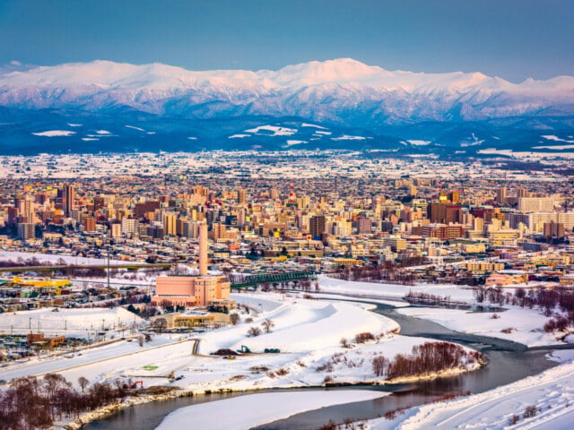 Asahikawa, Japan winter cityscape in Hokkaido. Asahikawa, Japan winter cityscape in Hokkaido at dusk.