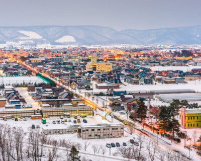 Furano, Hokkaido, Japan Furano, Hokkaido, Japan town skyline in winter at twilight.