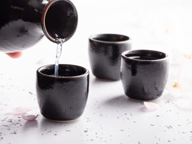 Japanese sake with blooming cherry. Traditionally served sake in Luxury and Exclusivity
