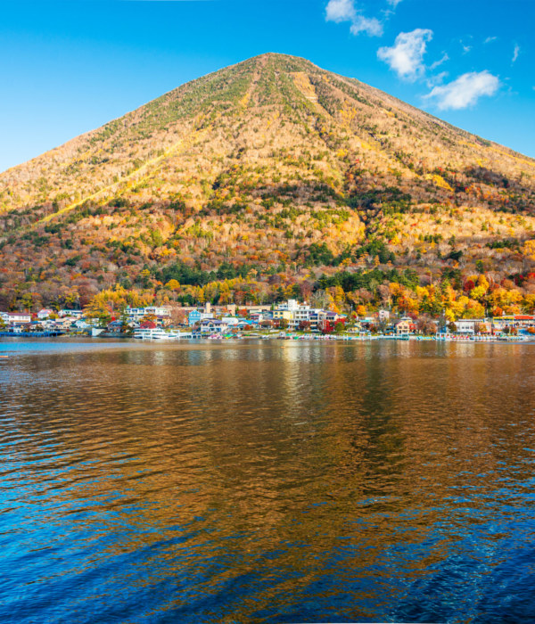 Mt. Nantai on Lake Chuzenji during the autumn season in Nikko, Japan.