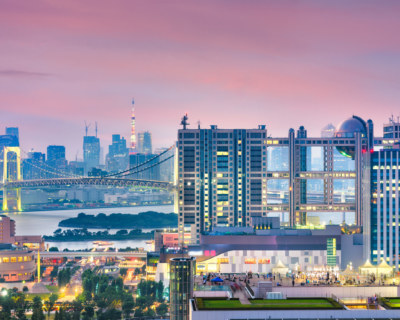 Tokyo, Japan Odaiba cityscape at twilight from across Tokyo bay.